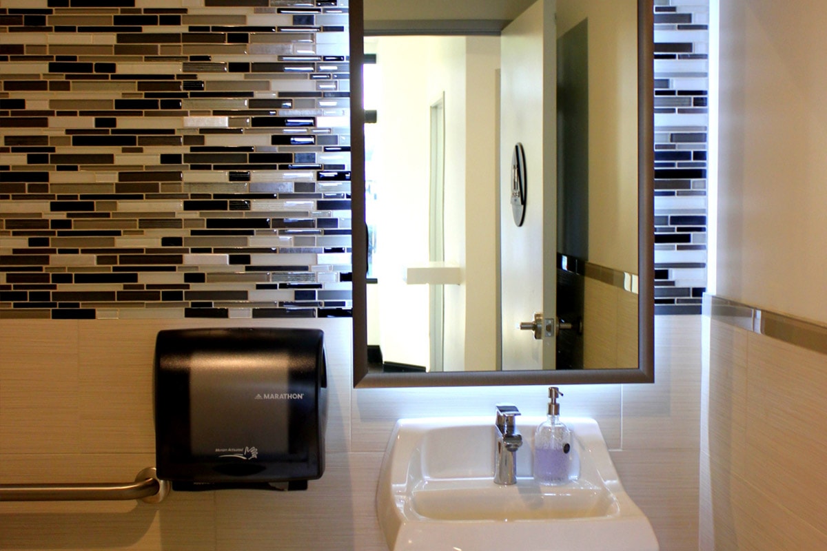 Patient restroom with mosaic tile